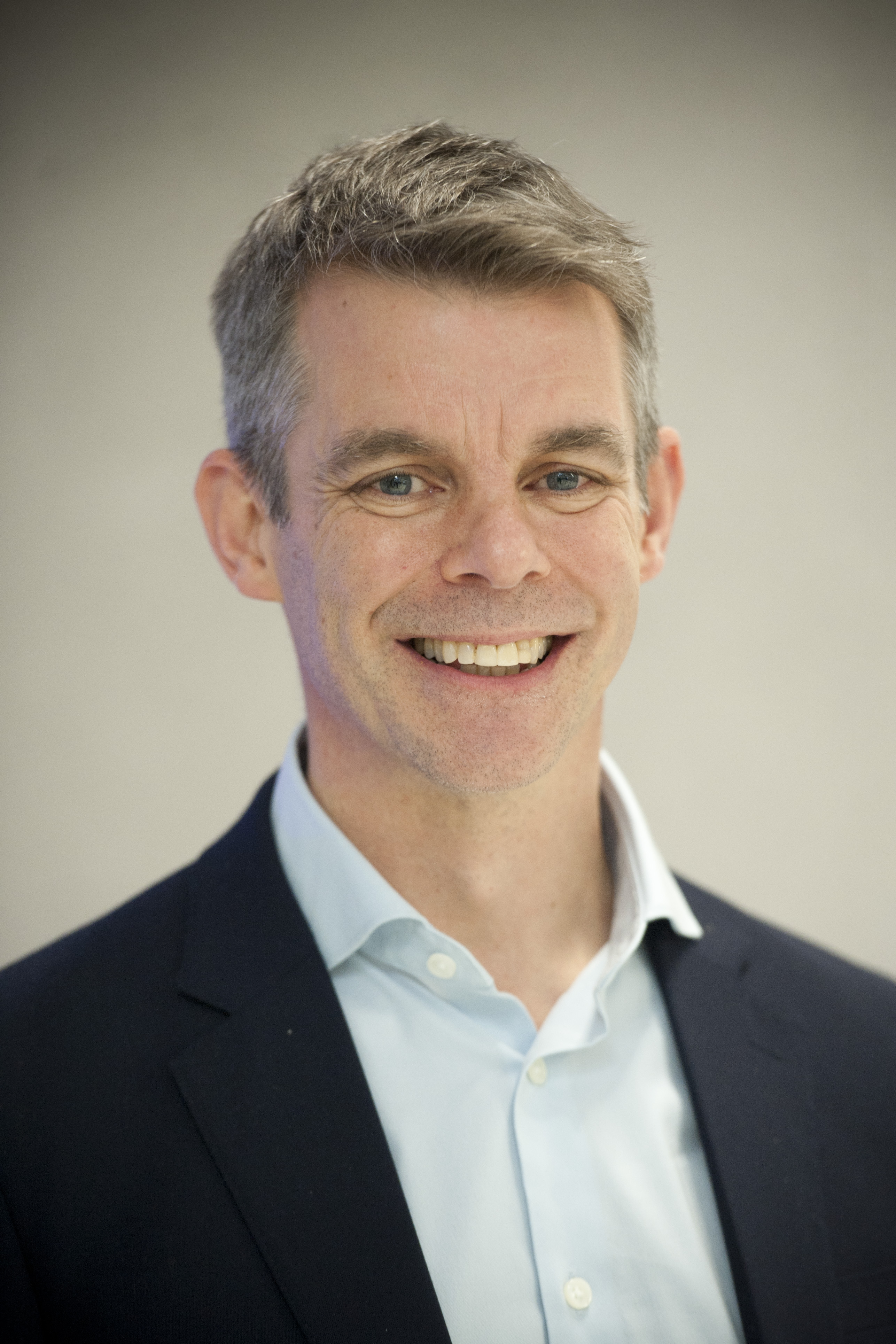 Dr Mike Davies smiling to camera