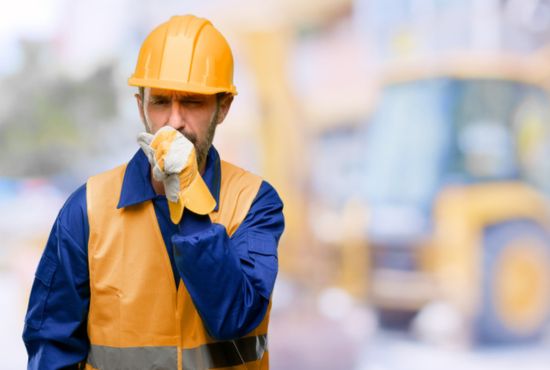 Construction worker coughing