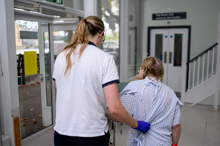 ILD female patient and clinician walking