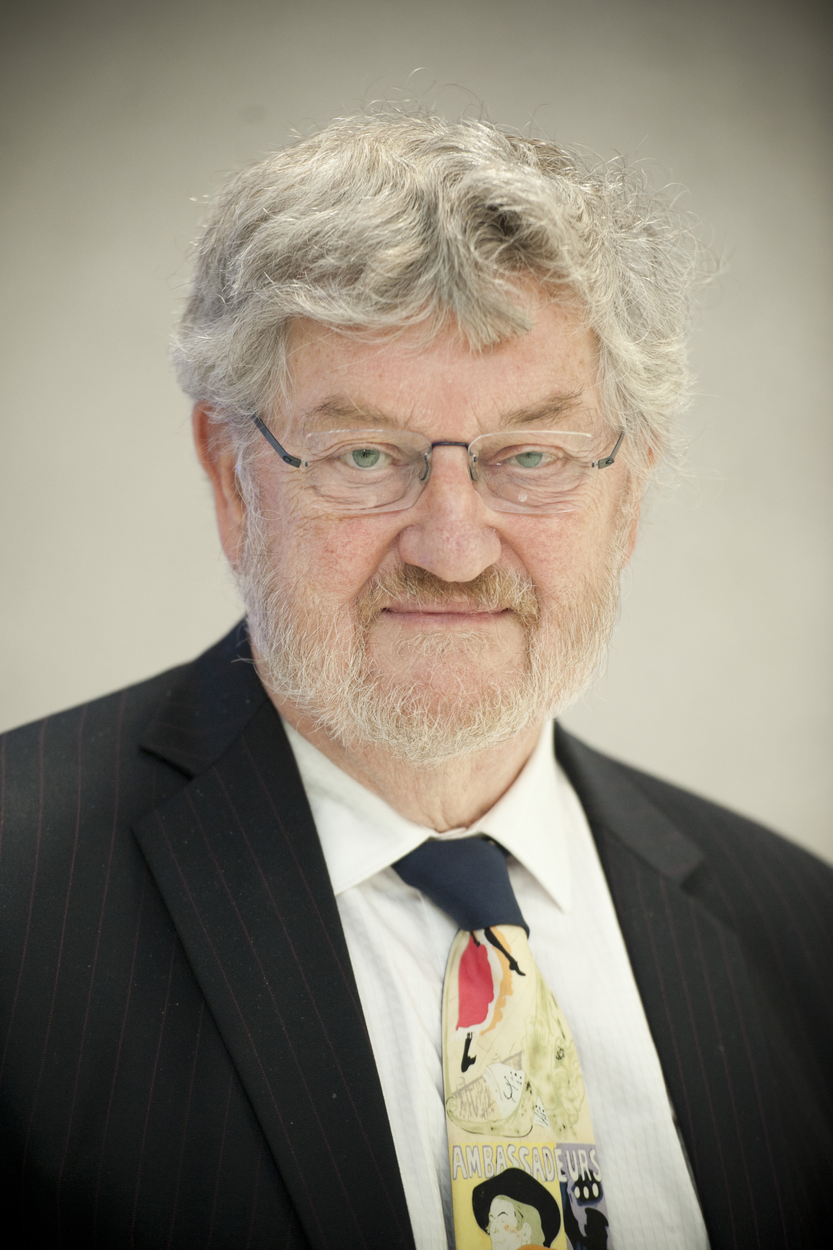 Professor Peter Calverley smiling to the camera